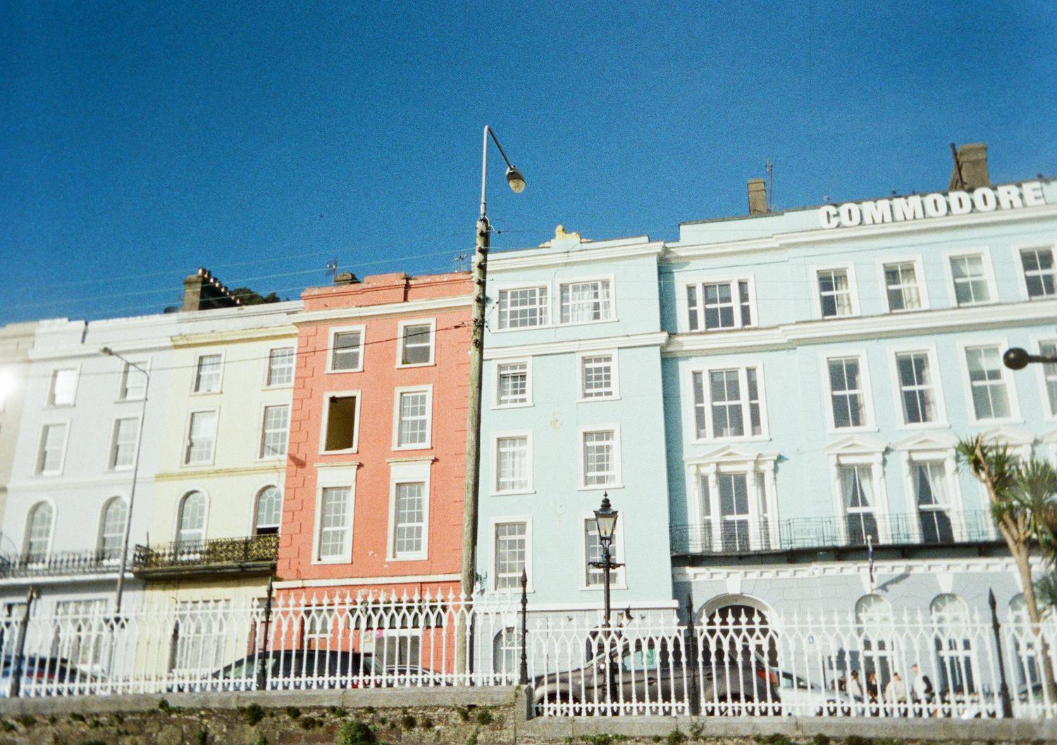 colourful big buildings on the waterfront in cobh