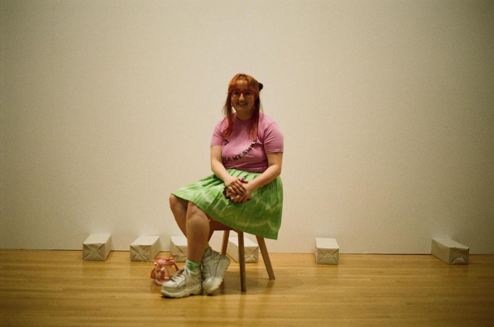 Gab posing in the waker art gallery with a green skirt on but it's ever so slightly blurry lol