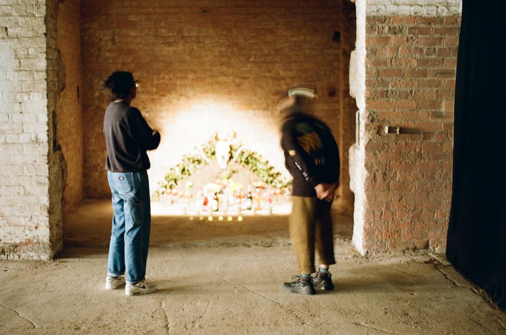 Zarina and Priya looking at art in the biennial but it's kinda blurry and hard to see any of the art