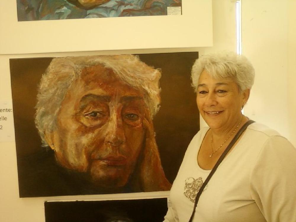 in this picture, my Nan stands next to the painting - she came to visit my end of year show during AS level. she's smiling