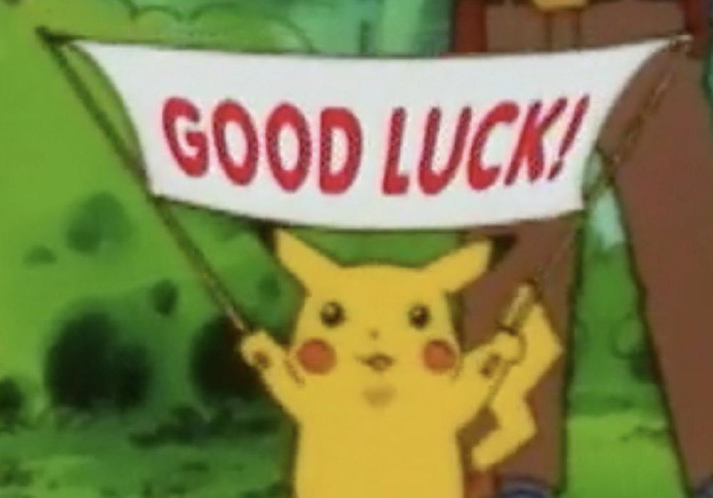 pikachu holding up a good luck sign