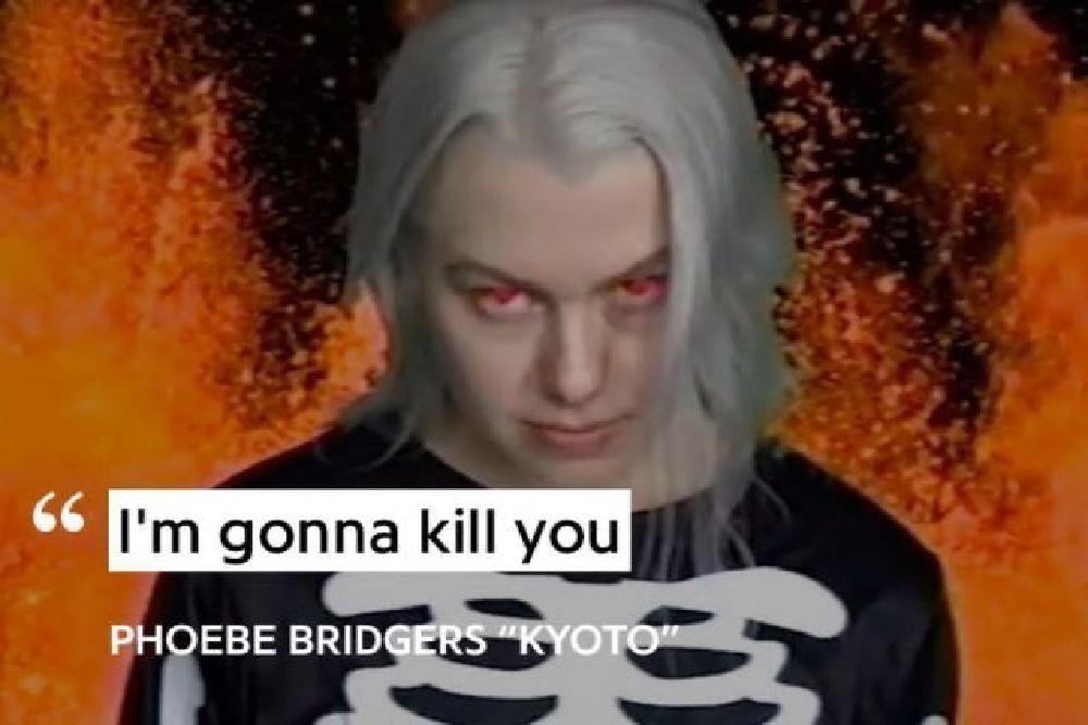 edit of phoebe bridgers in front of splashing lava with red eyes saying i'm gonna kill you
