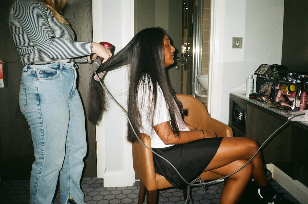 zarina getting her hair blow dried