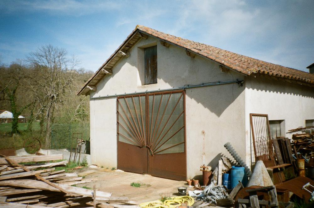 a shot of the studio with big cast iron doors
