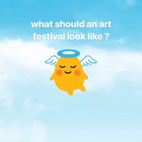 a blue cloudy sky with a little emoji angel happy in the centre with the title &lsquo;what should an art festival look like?'