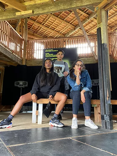 Zarina Seema and Amrita are all sat on a bench posing for the camera in the show