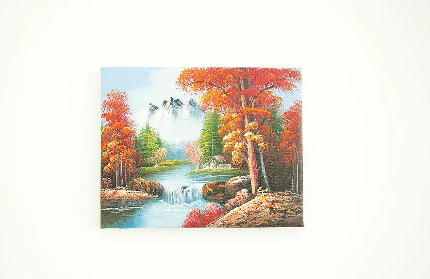 a bob ross style landscape painting of mountains, a stream, small waterfall, a little cabin, and big tall autumnal trees