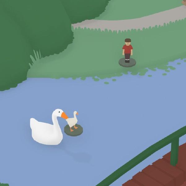 the goose is in a little stream holding a tiny model of a goose in its mouth