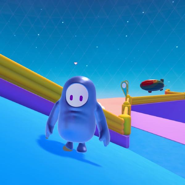 a blue bean with arms and legs and two little purple eyes for a face is stood on a slope against a blue starry background