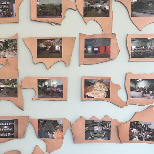 lots of photographs of an indoor warehouse looking space with close ups of objects, and each photograph is stuck against a tan piece of material in random shapes framing the image