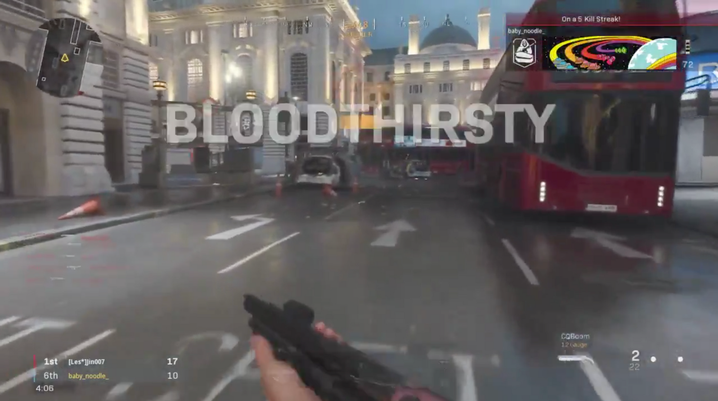 a first person shot holding a gun in a busy Picadilly-looking area with the word BLOODTHIRSTY big across the screen