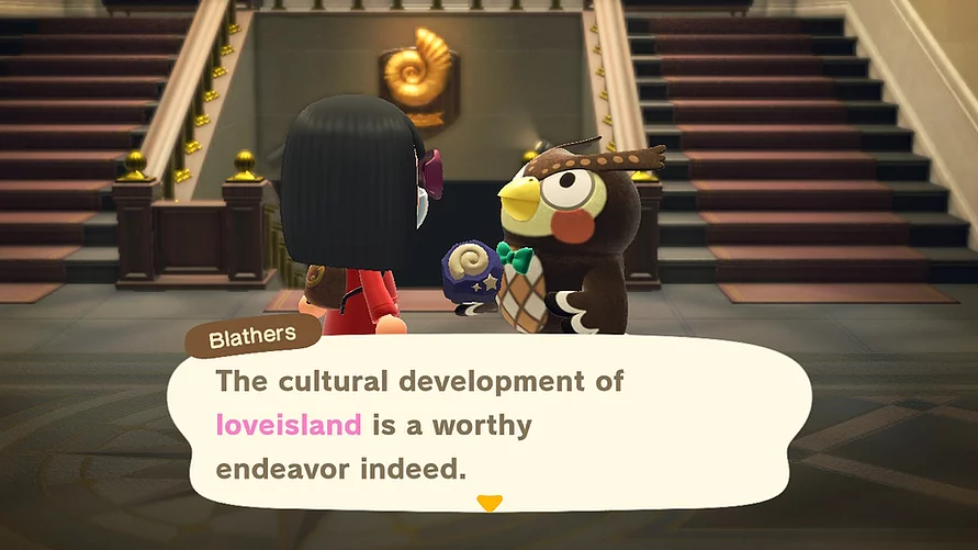 Stood at the entrance to the museum, Blathers is holding a fossil that has just been donated and saying &lsquo;the cultural development of love island is a worth endeavour indeed&rsquo;