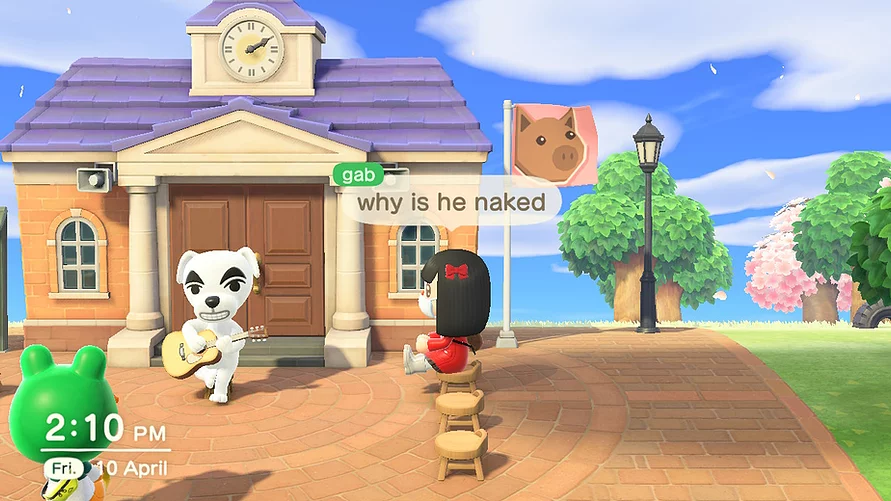Gab sits watching KK slider who is playing guitar and smiling outside the town hall and there is a speech bubble above her head saying &lsquo;why is he naked&rsquo;