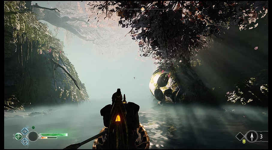 Kratos rows a small boat through still waters, where there is a giant statue of a head in the water as if it has fallen from something above