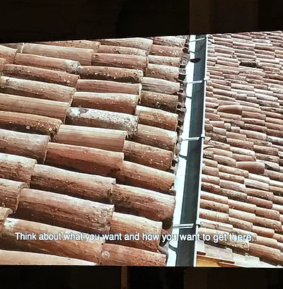 a shot of tiles on a roof with the caption &lsquo;think about what you want and how you want to get there&rsquo;