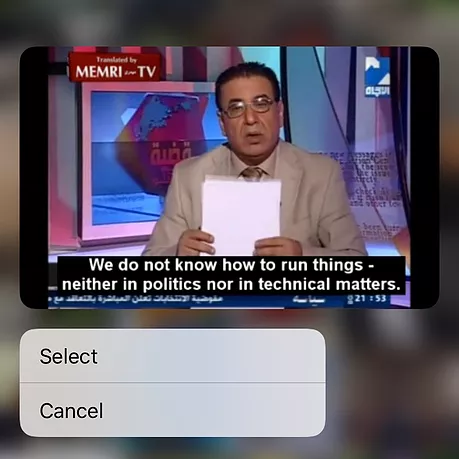 a screenshot of a newsreader saying we do not know how to run things - neither in politics nor in technical matters, and zarina has pressed in on the image so below the iphone says &lsquo;select&rsquo; or &lsquo;cancel&rsquo;