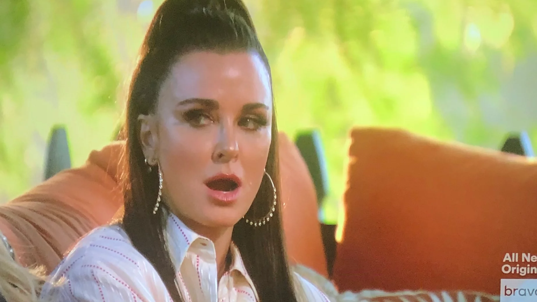 Kyle Richards looks shocked at someone off camera