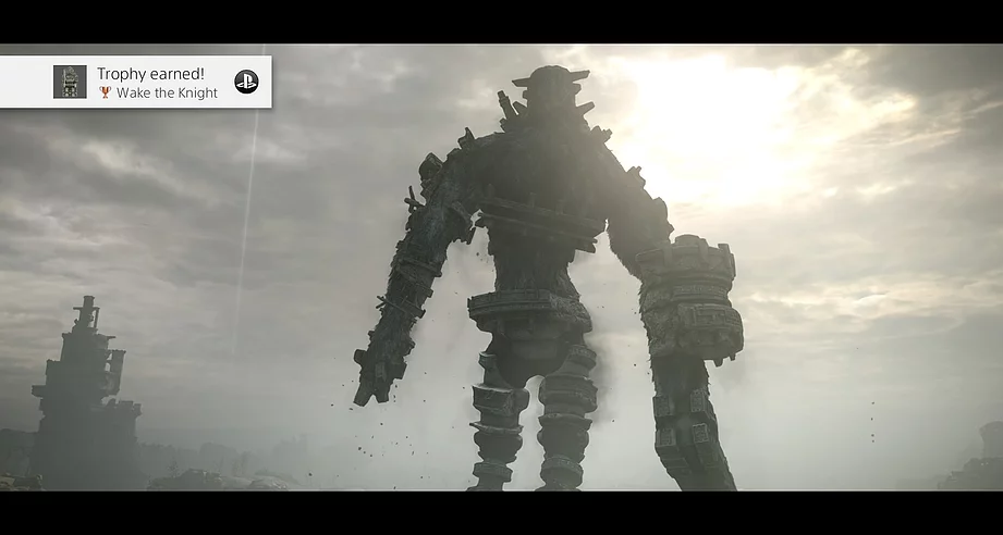 a massive knight wearing armour that looks like different pieces of buildings wrapped around it stands against the sun