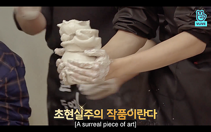 someone is shaping wet clay and the caption tags it as a surreal piece of art