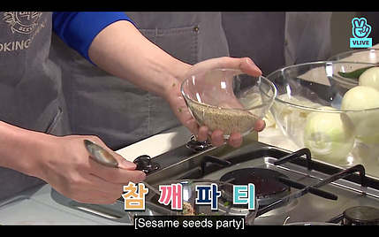 someone is cooking at the caption says it is a sesame seed party