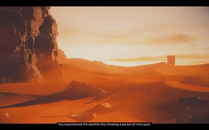 there is a desert scene looking almost on fire with how bright and colourful the sunset is
