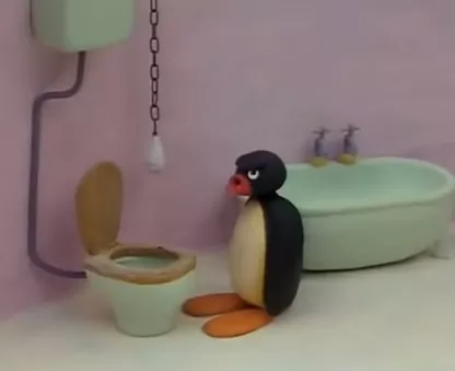 angry pingu stood with an annoyed face on next to a toilet