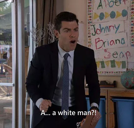 a meme of Schmidt from New Girl looking apalled and shocked and saying &lsquo;a white man&rsquo; question mark exclamation point